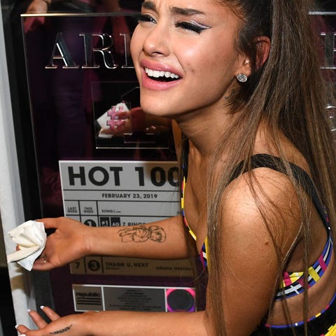How Professional Help Transformed Ariana Grande's Hair And Tattoos How Professional Help Transformed Ariana Grande's Hair And Tattoos